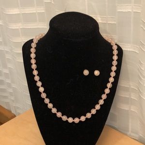 Set of a 24” pink glass pearl necklace and stud earrings